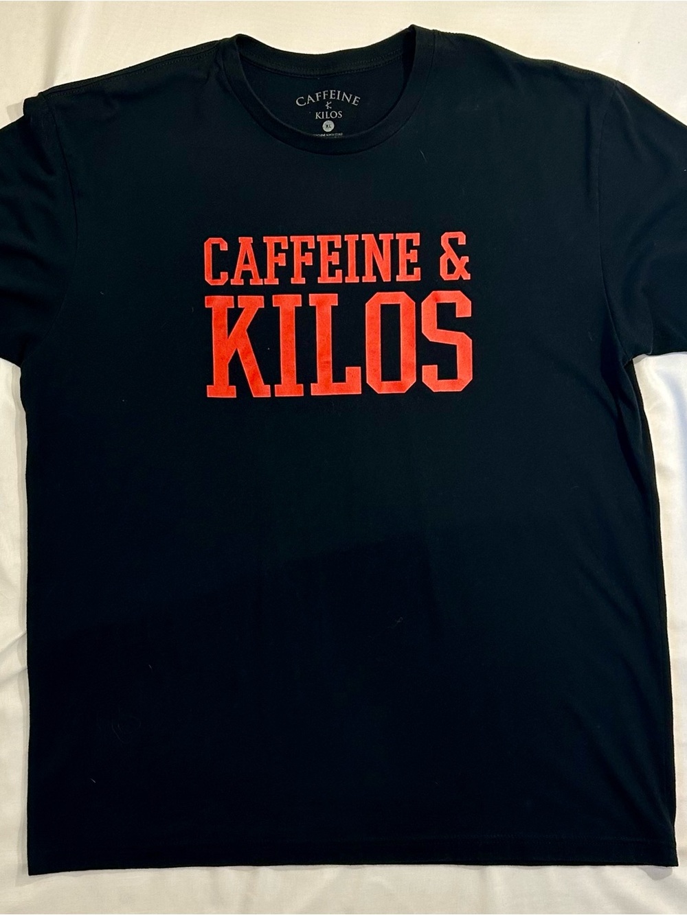 Men's Black Tee with Red Chest Logo